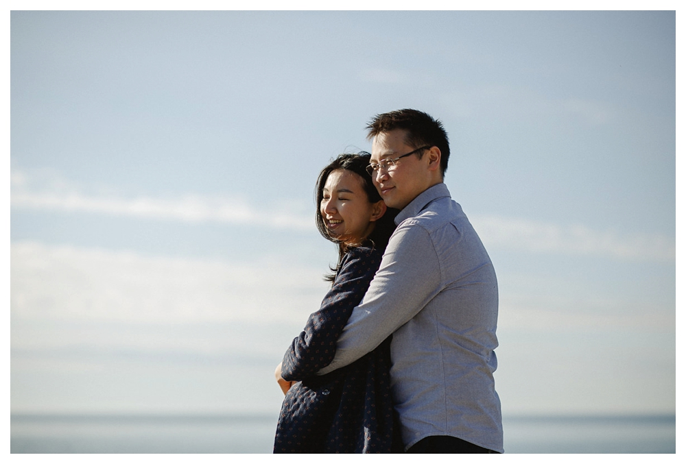 Nothing but sky, lake, sunshine and smiles on this engagement photo shoot in Toronto. 