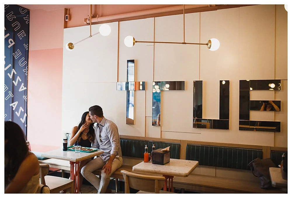 Engagement day photos sealed with a kiss at True True Pizza downtown Toronto, just like on a date. 