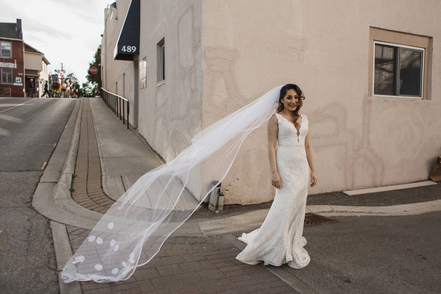 Bride's veil flowing in France like wedding scene.