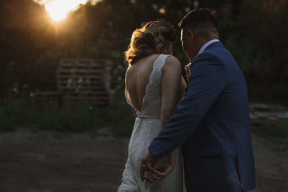 Sunset intimate moment between couple in Toronto.