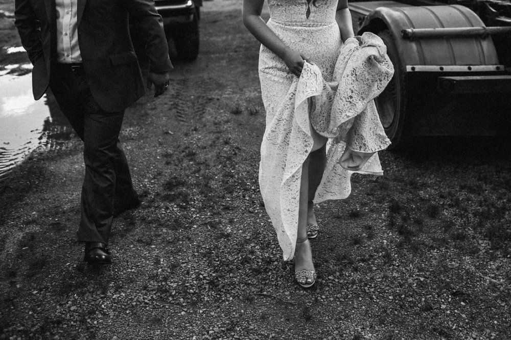 Bride and groom walk to Madsens for wedding.