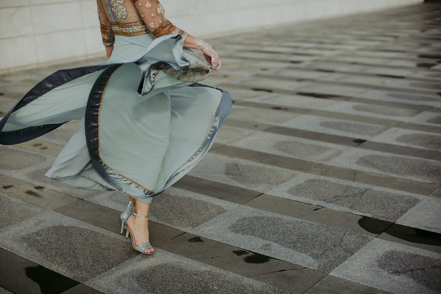 Bride twirling in Indian dress at Aga Khan.