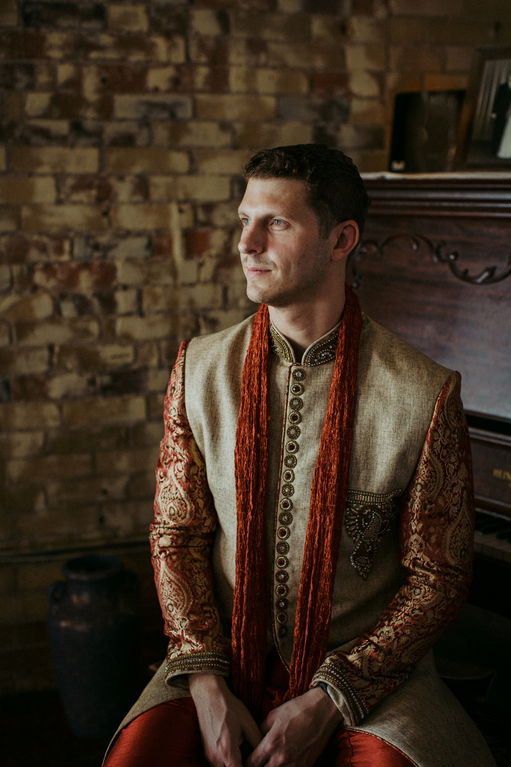 Groom in Indian wedding at Ben McNally bookstore.