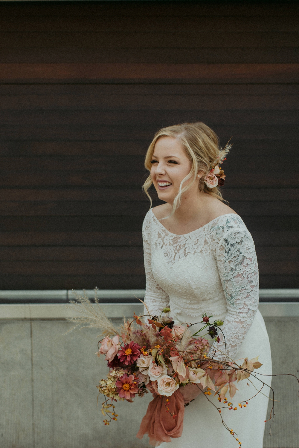 Bride and flowers at City Hall Toronto wedding.