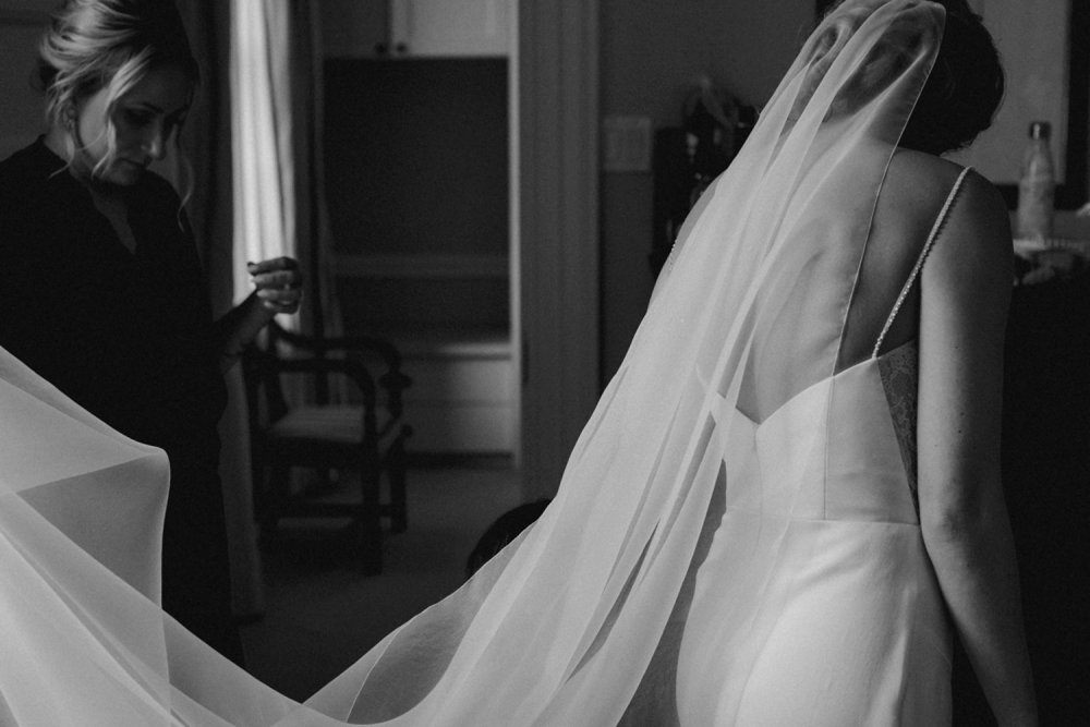 Bride in Catherine Langlois dress and veil at Langdon Hall wedding.