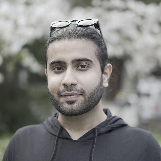 Headshot_Brick_BG_2.jpg