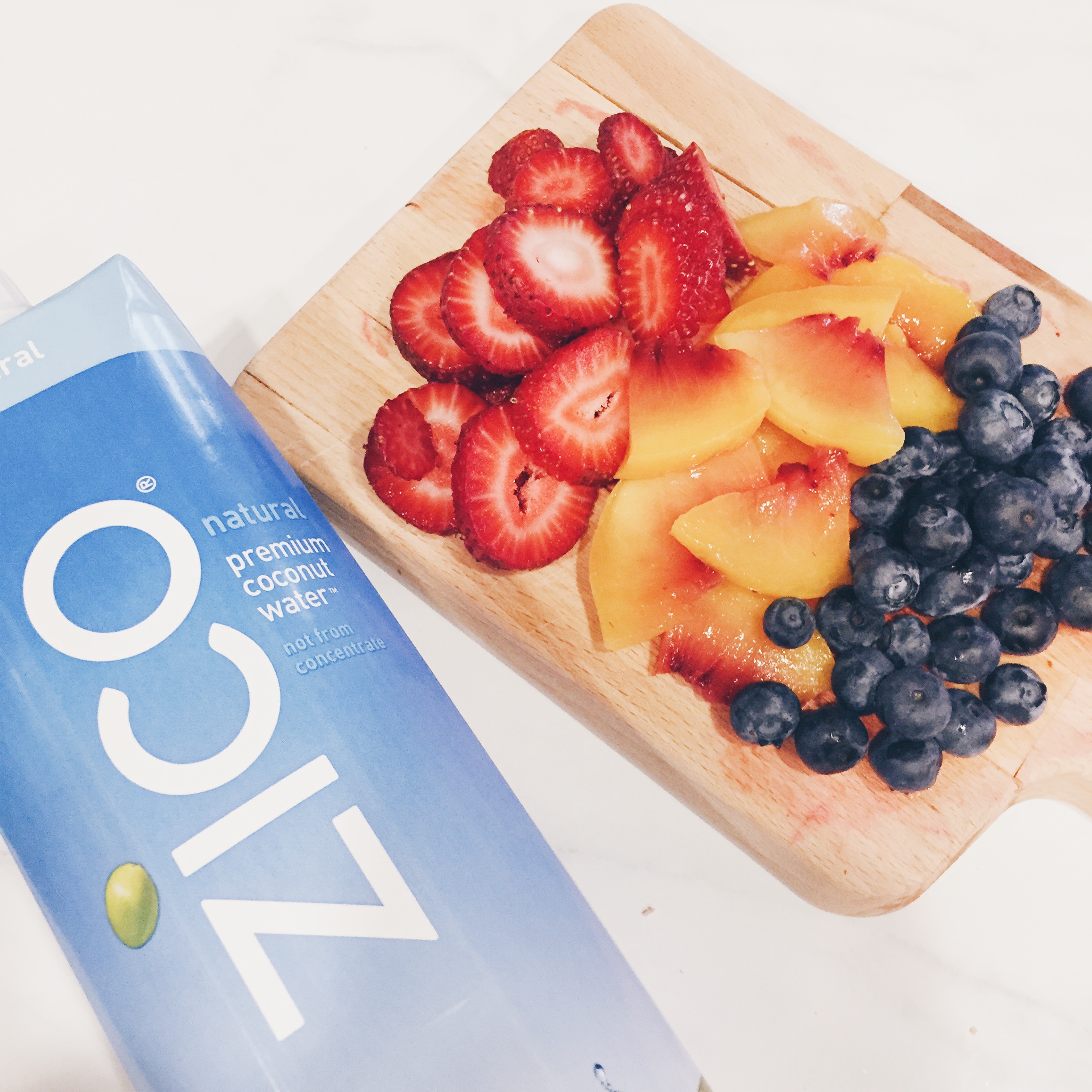 a mixture of fruit and coconut water