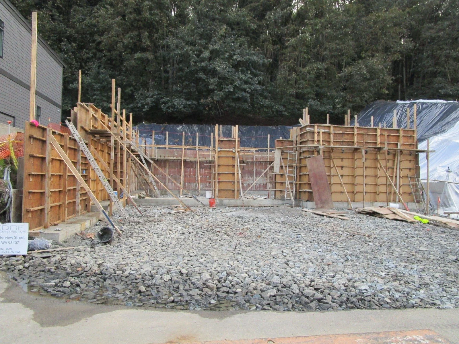 Formwork for concrete in place, house is set back into the hillside.