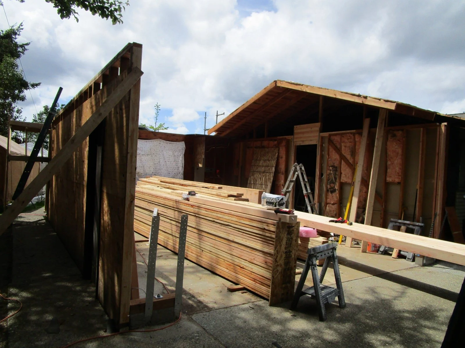 Removal of garage roof, a new floor will go over this area.