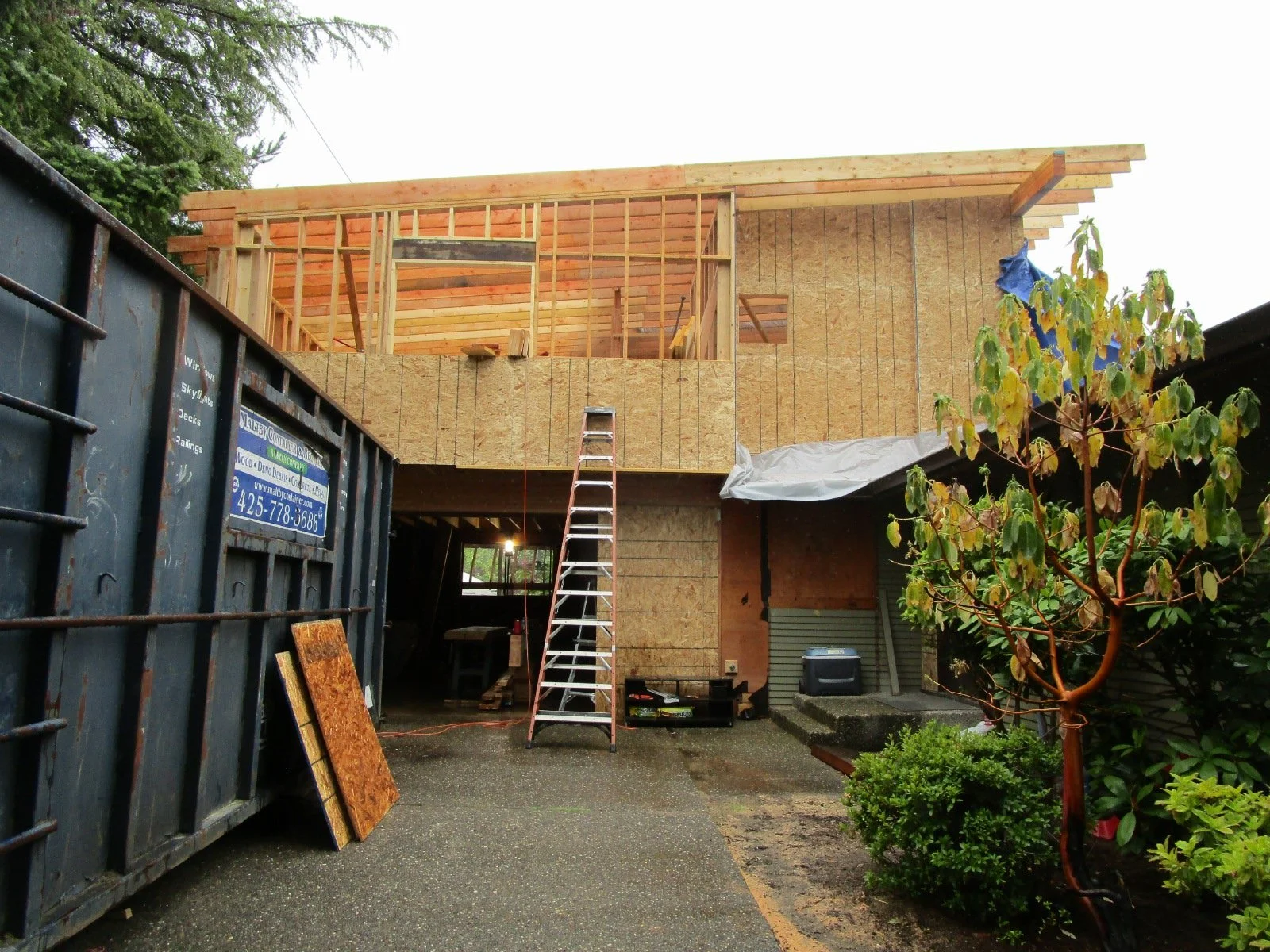 Framing the second floor addition.