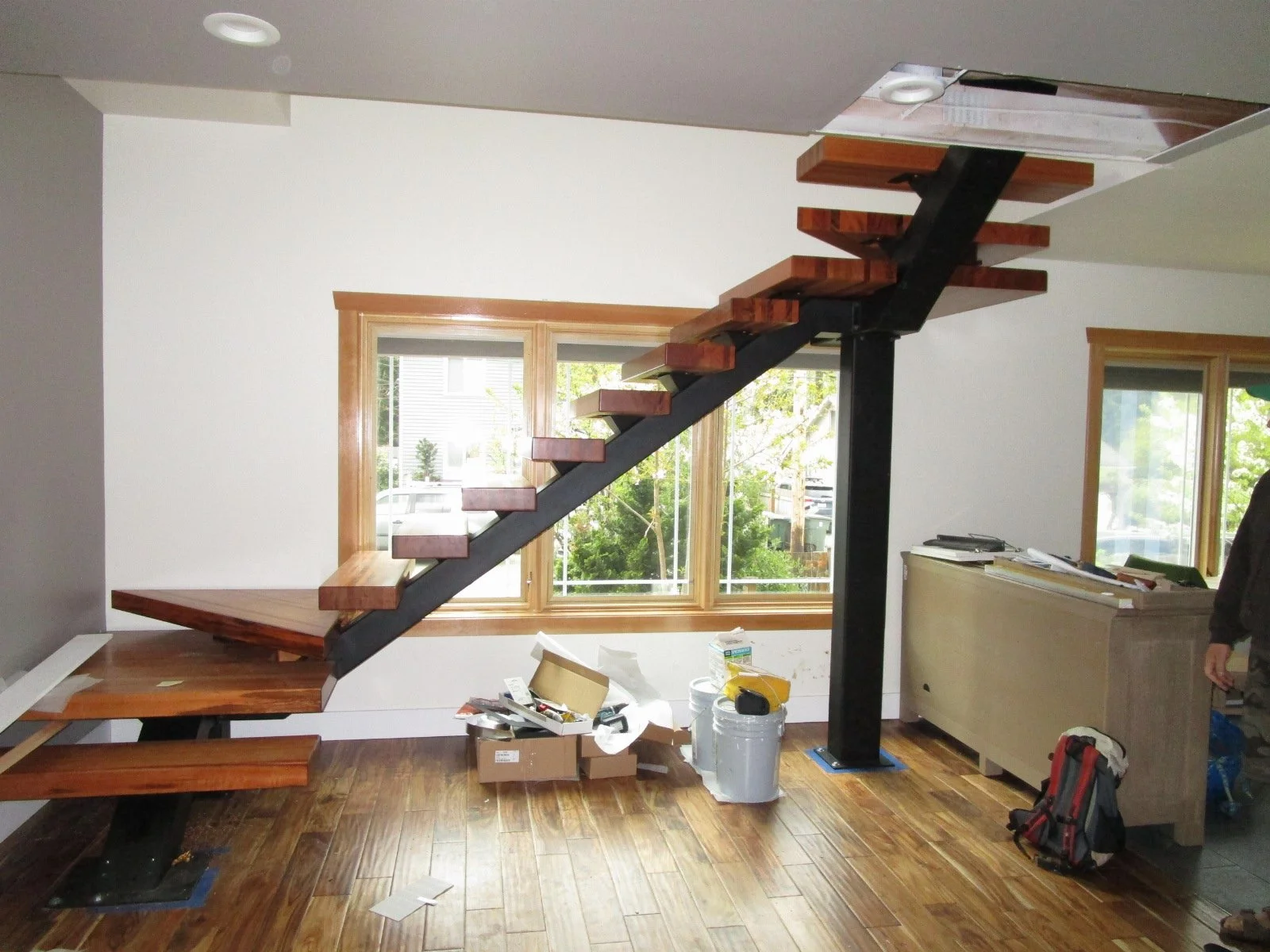 Stairs to new second floor going in. Handrails next. Southern windows will flood the area with light.