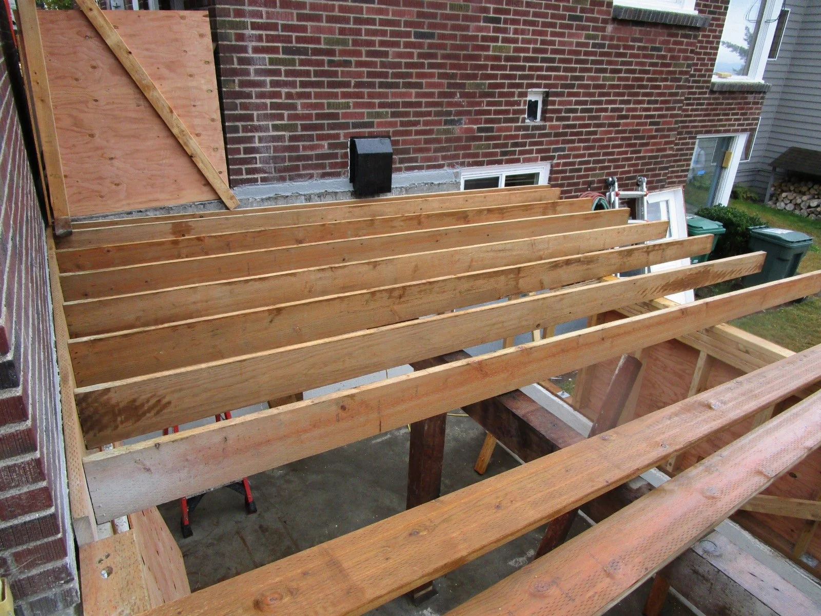 New deck over the garden shed being built.