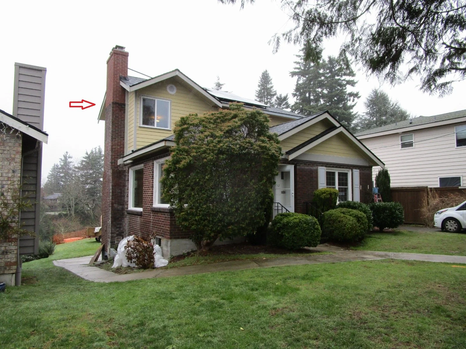 Chimney extension. Over time will patina to blend with the existing brick work.