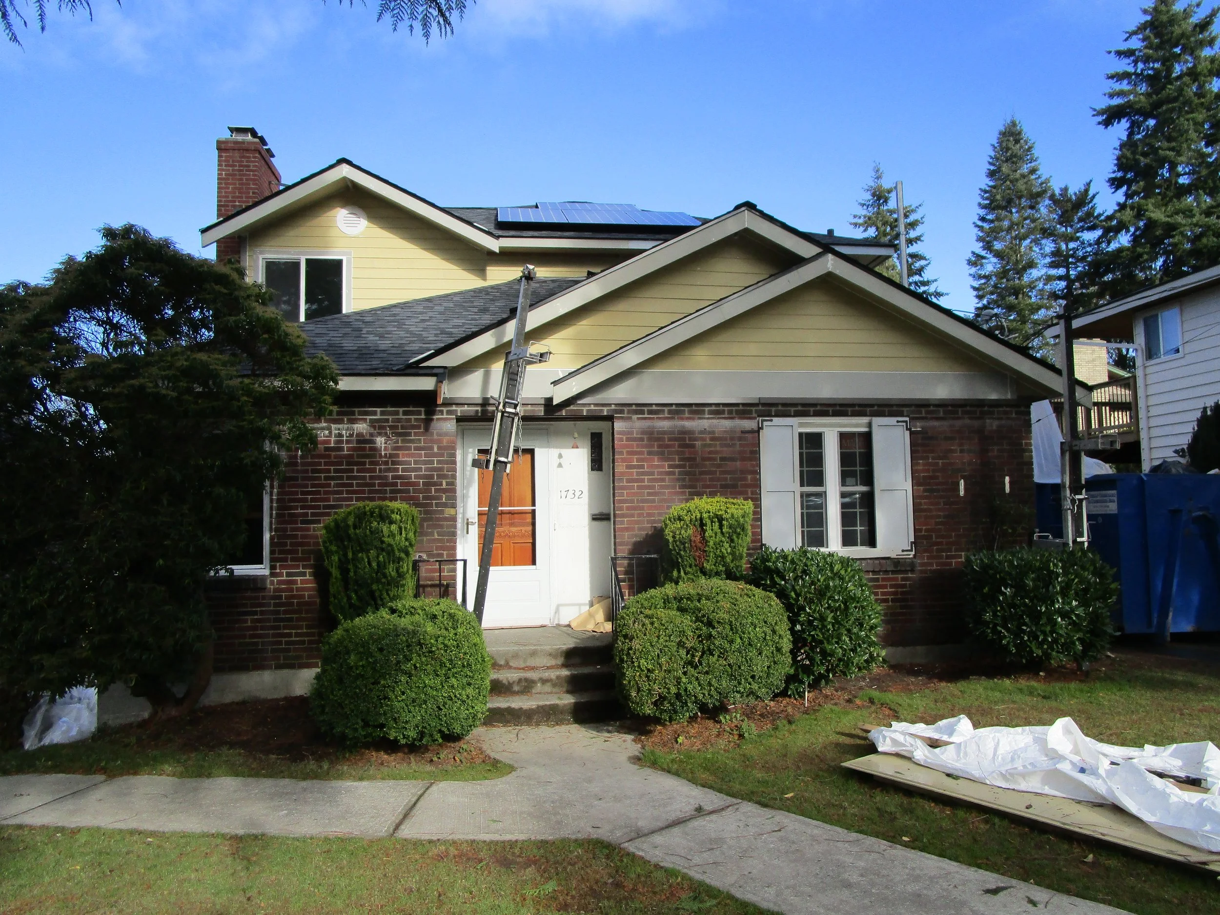 Trim work going on. Note the extended chimney.