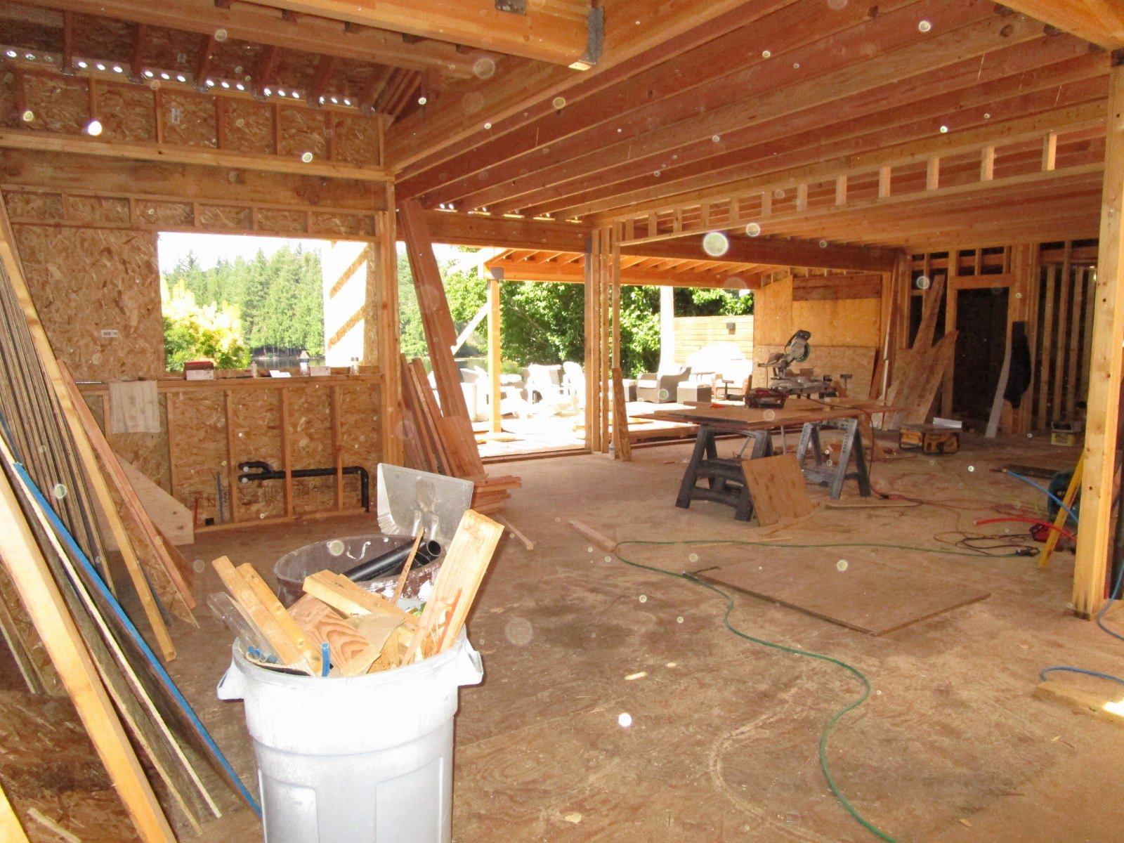 Beam work coming along viewing from the Kitchen over to the Living Room.