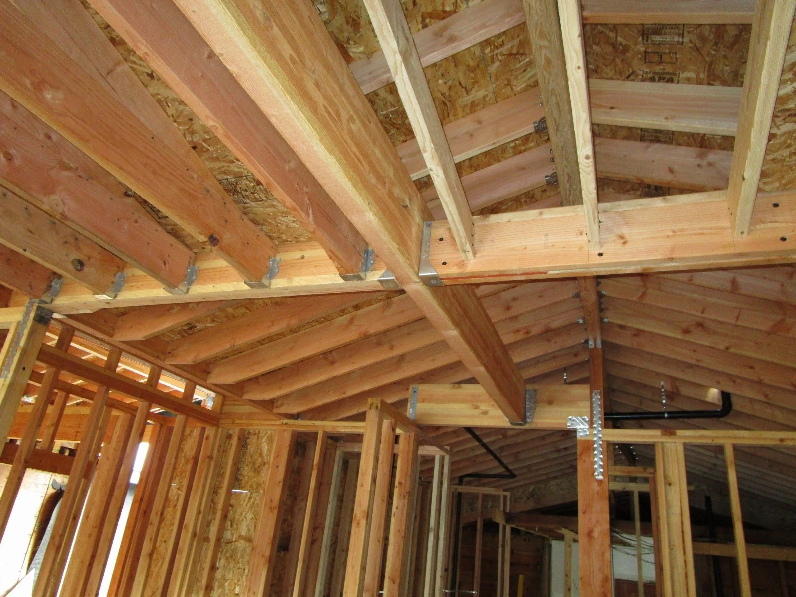 Common condition of beams hanging from other beams in this project.