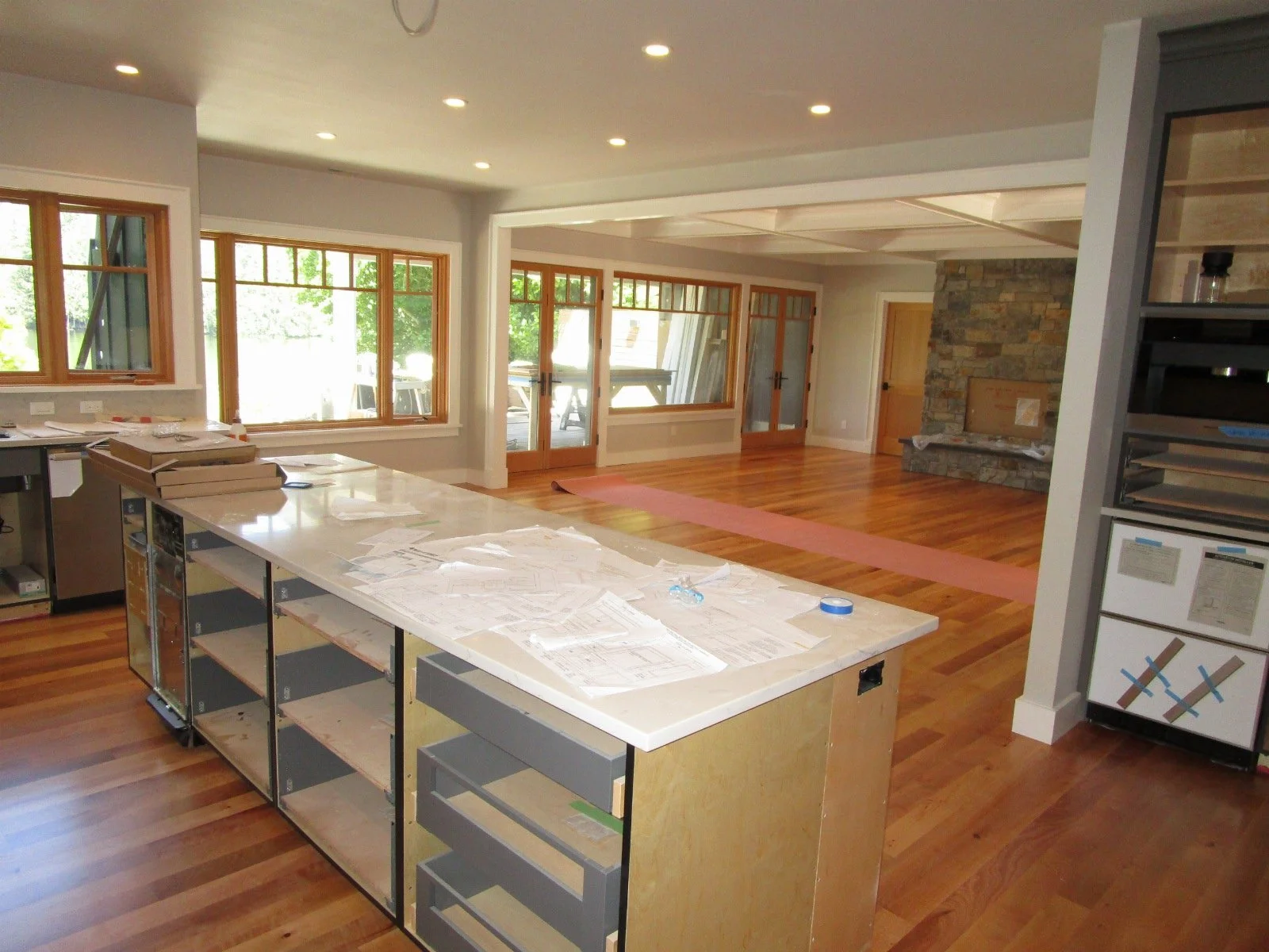 Cabinets going in the Kitchen, the Living Room beyond.