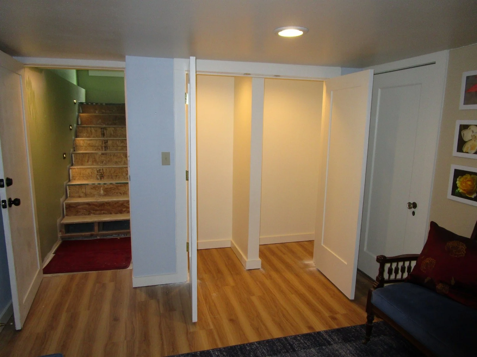 New stairs on the left. Lighted closets are were the old unsafe stairs were.