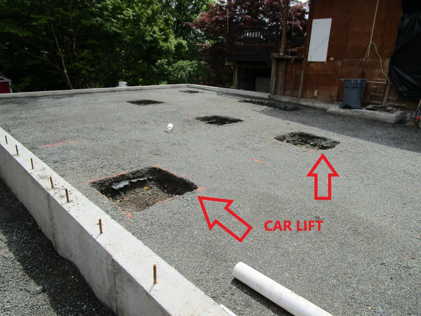 Perimeter foundation set. Gravel in place, locations shown for interior concrete pads.