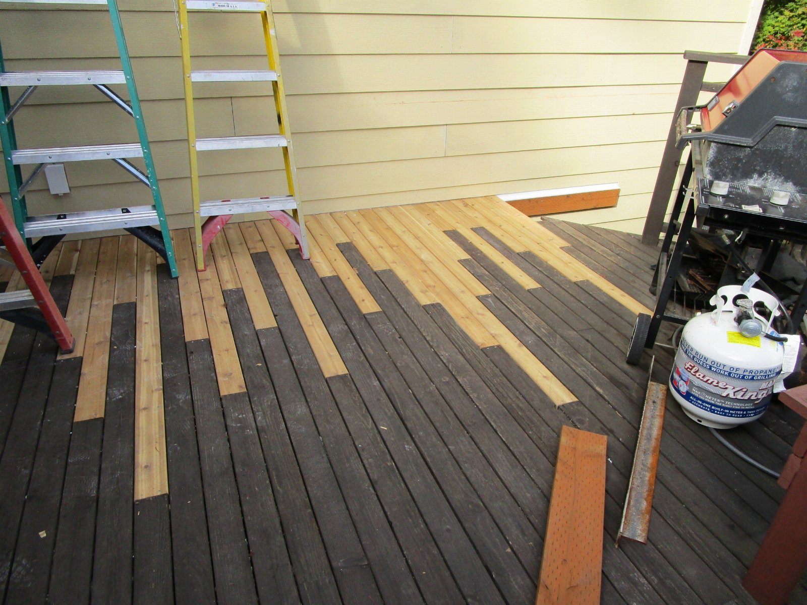 Repairing the existing deck in the back yard.