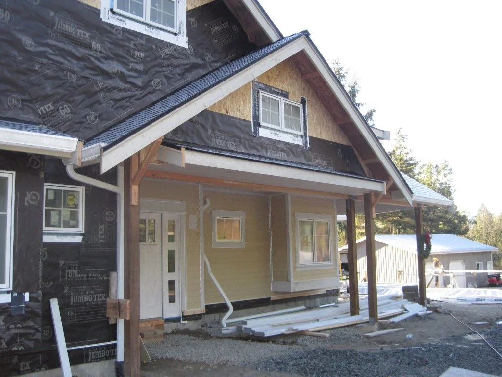 Covered porch at entry taking shape.