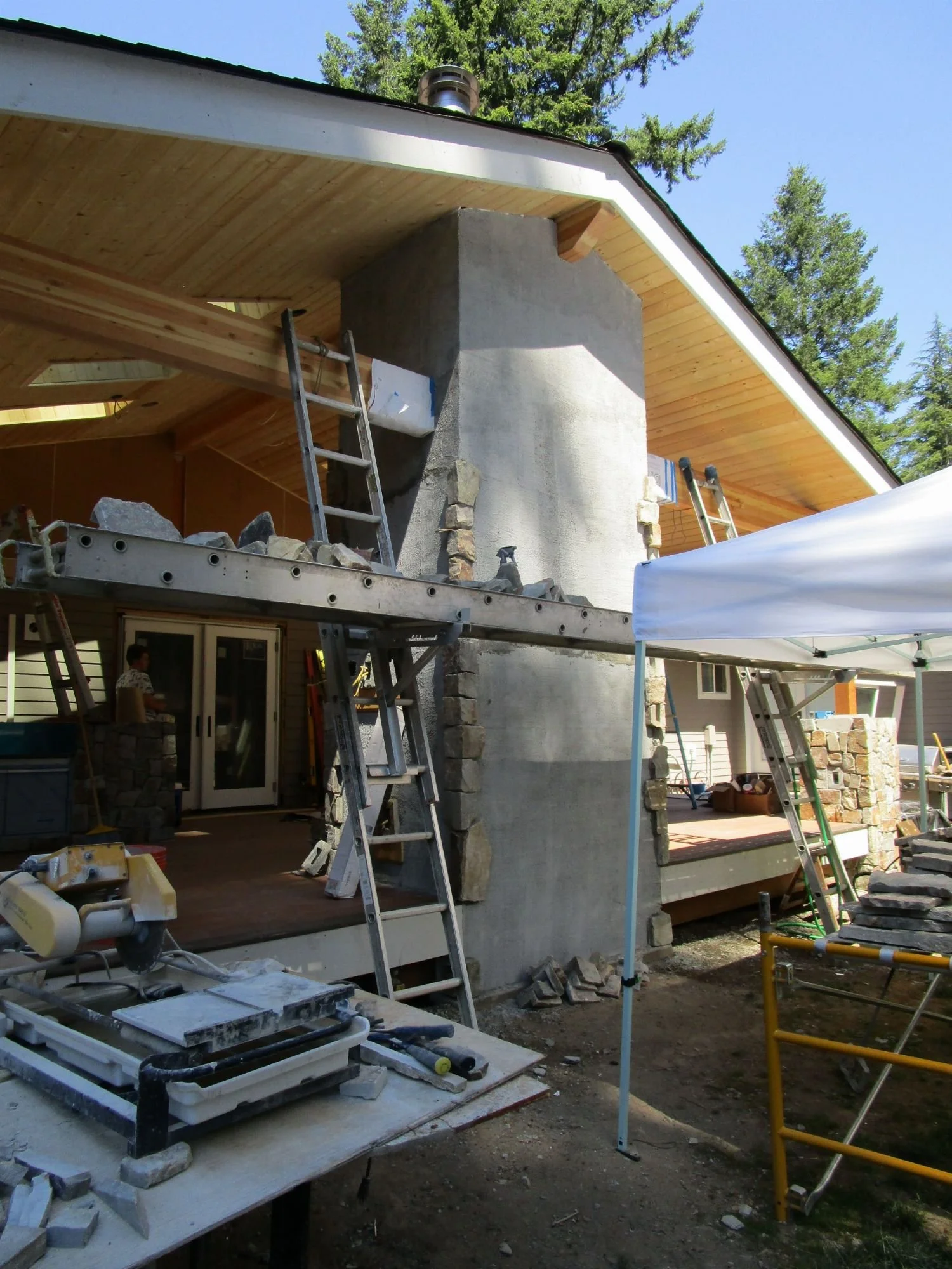 Fireplace getting it's stone work.