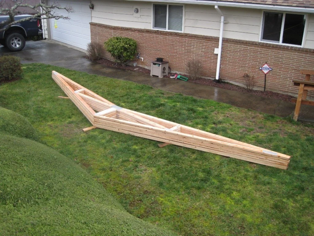 Great Room ceiling will get a vault using these scissor trusses.