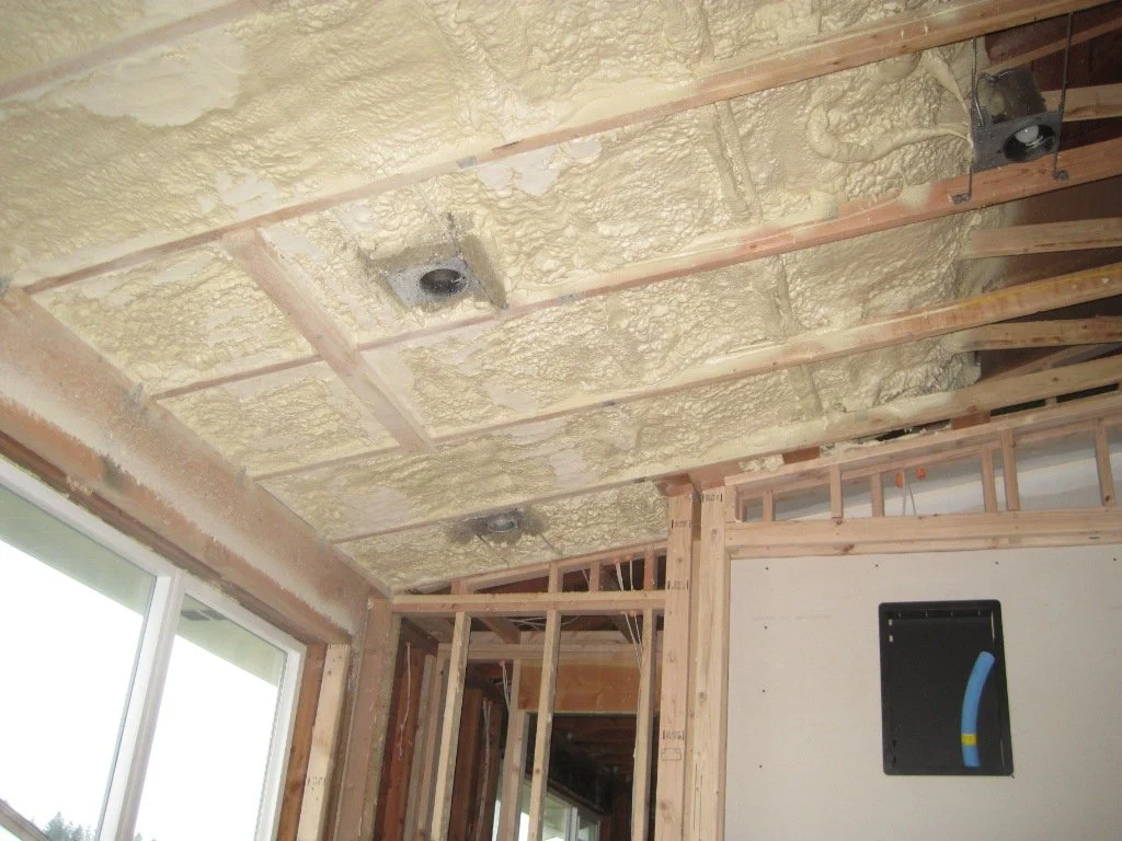 Because of the lack of depth at the end of the scissor truss, spray foam insulation is used.