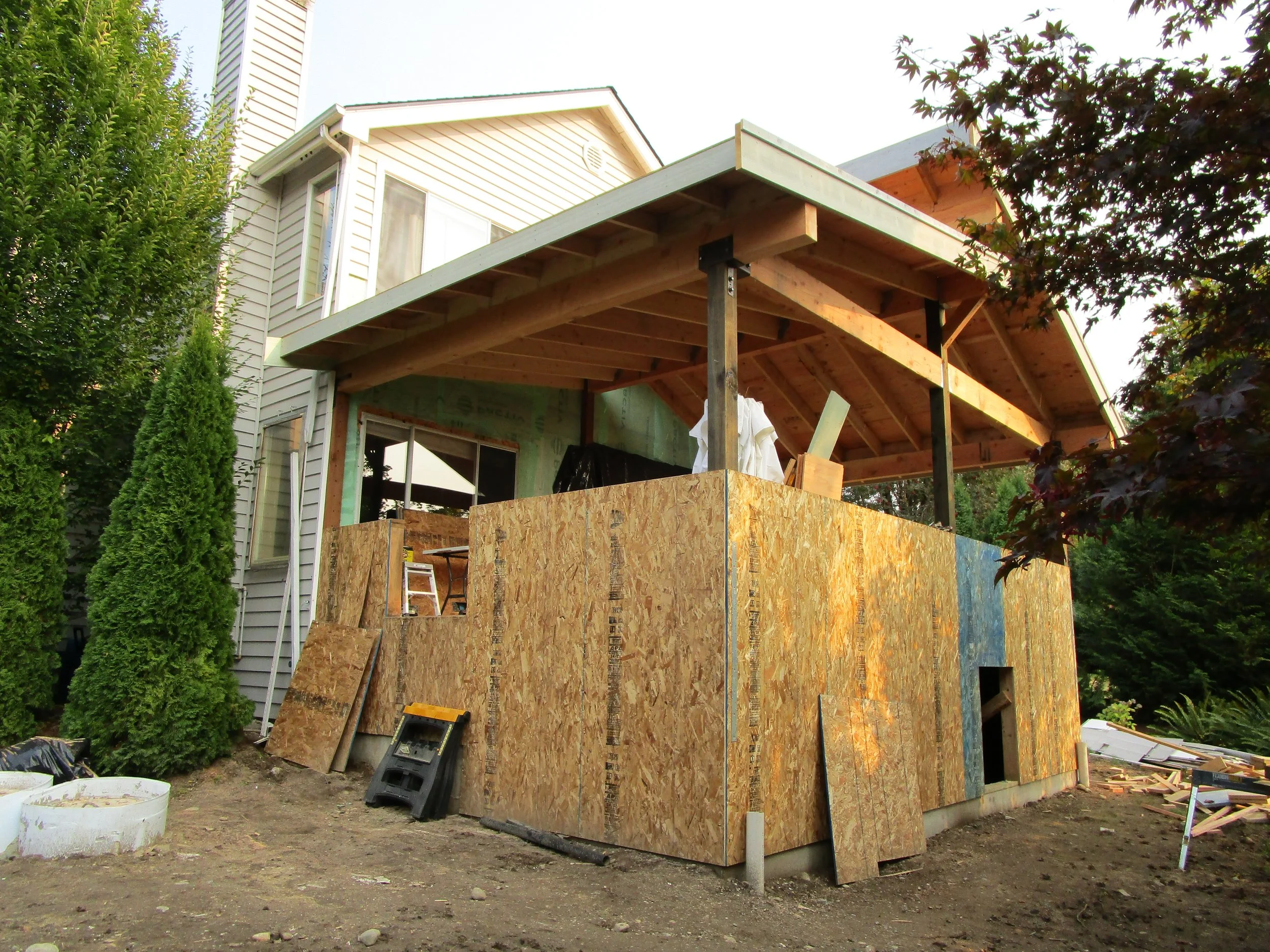 Roof framing mostly complete. 