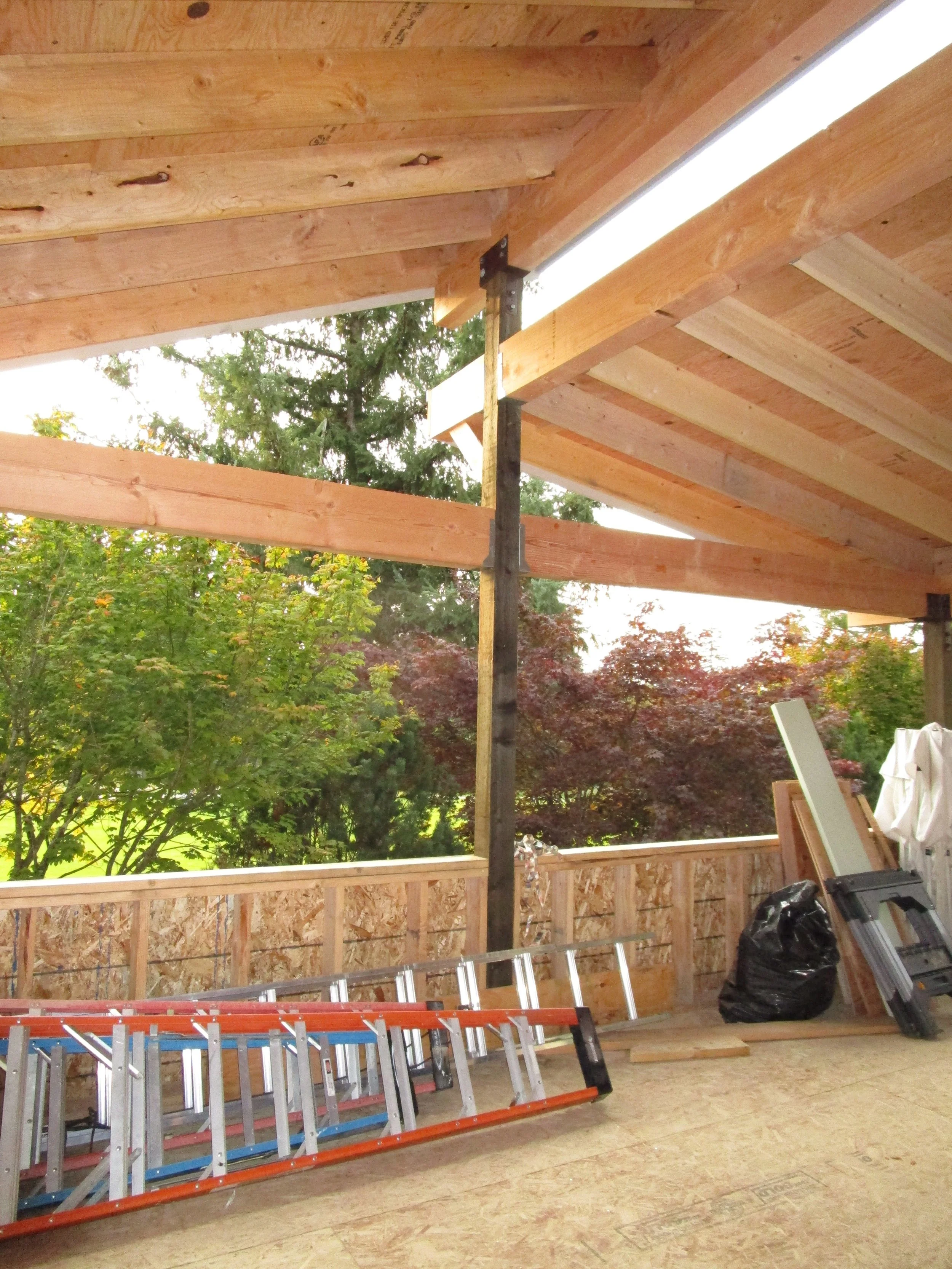 We had the roofs have different pitches both to avoid windows on the house, and to allow more light in.