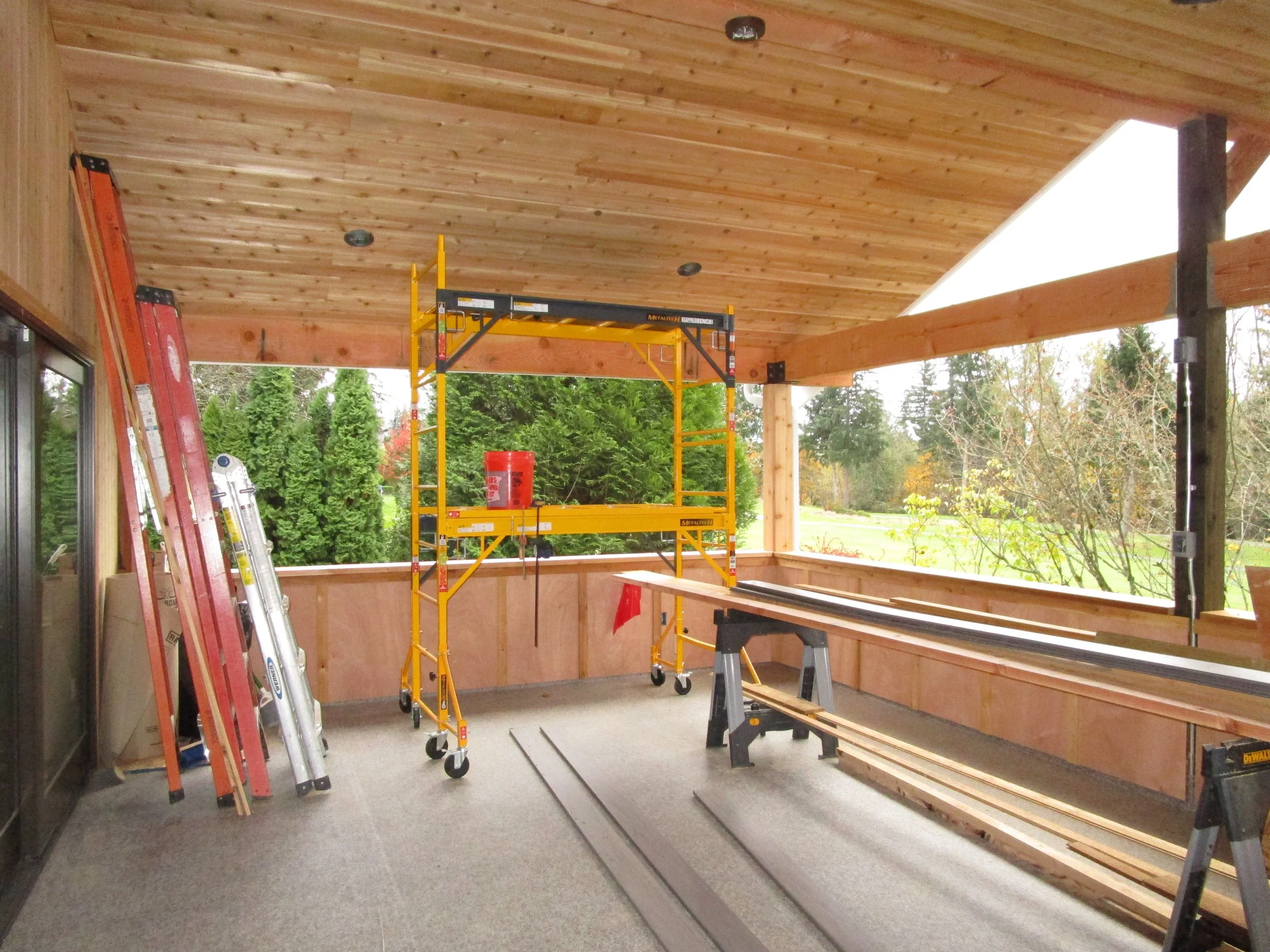 The cabana looks over a golf fairway.