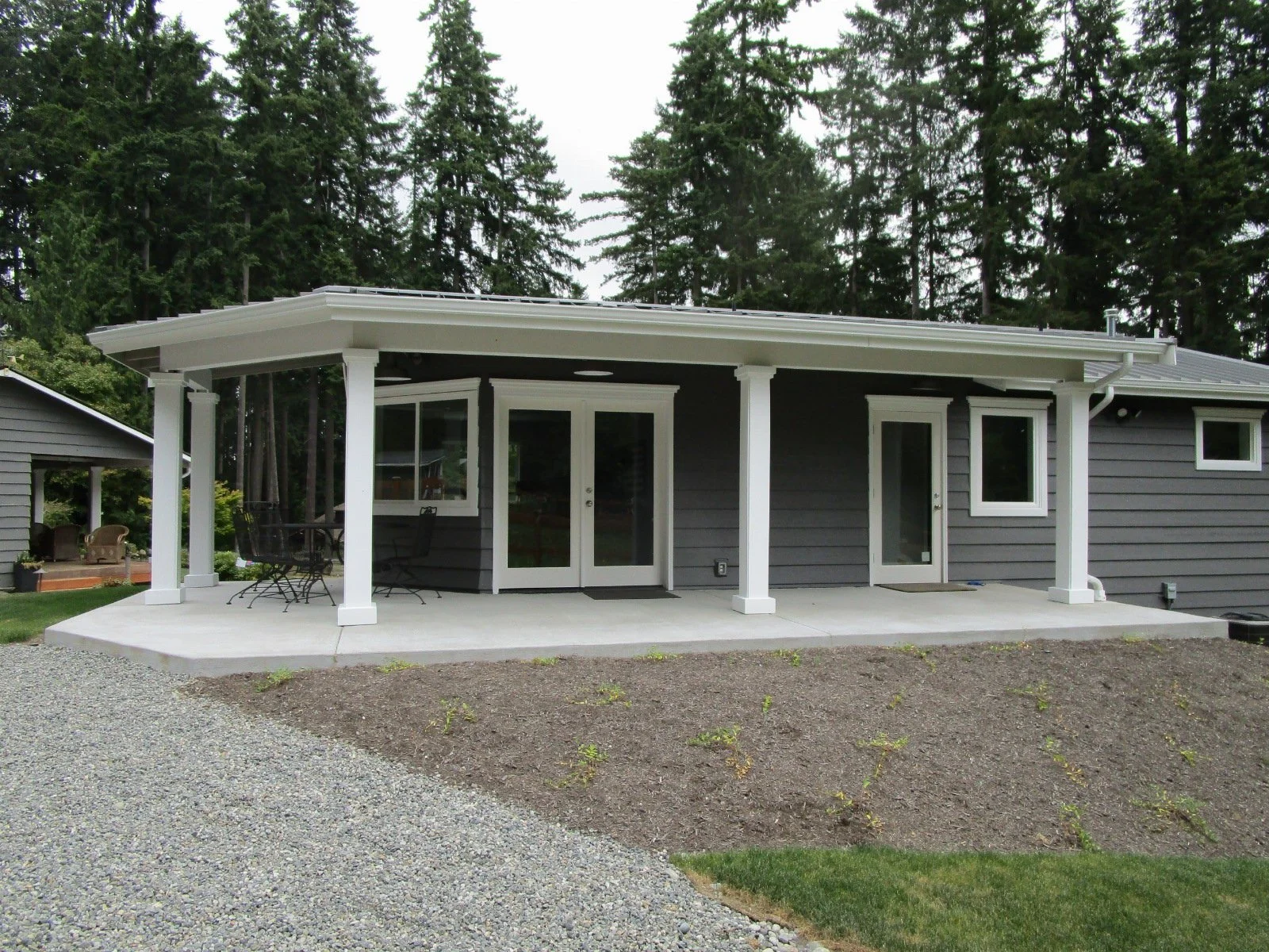 ADU entrance with it's own wrap around porch.