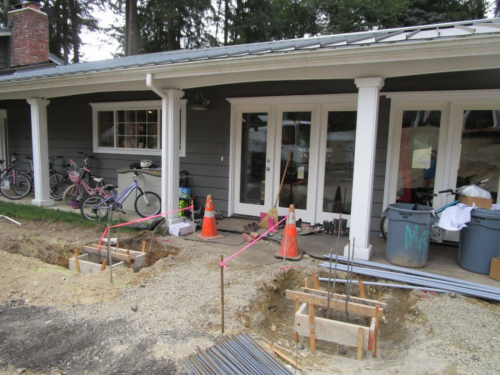 We'll also add a proper covered entry roof to mark the entry to the existing house.