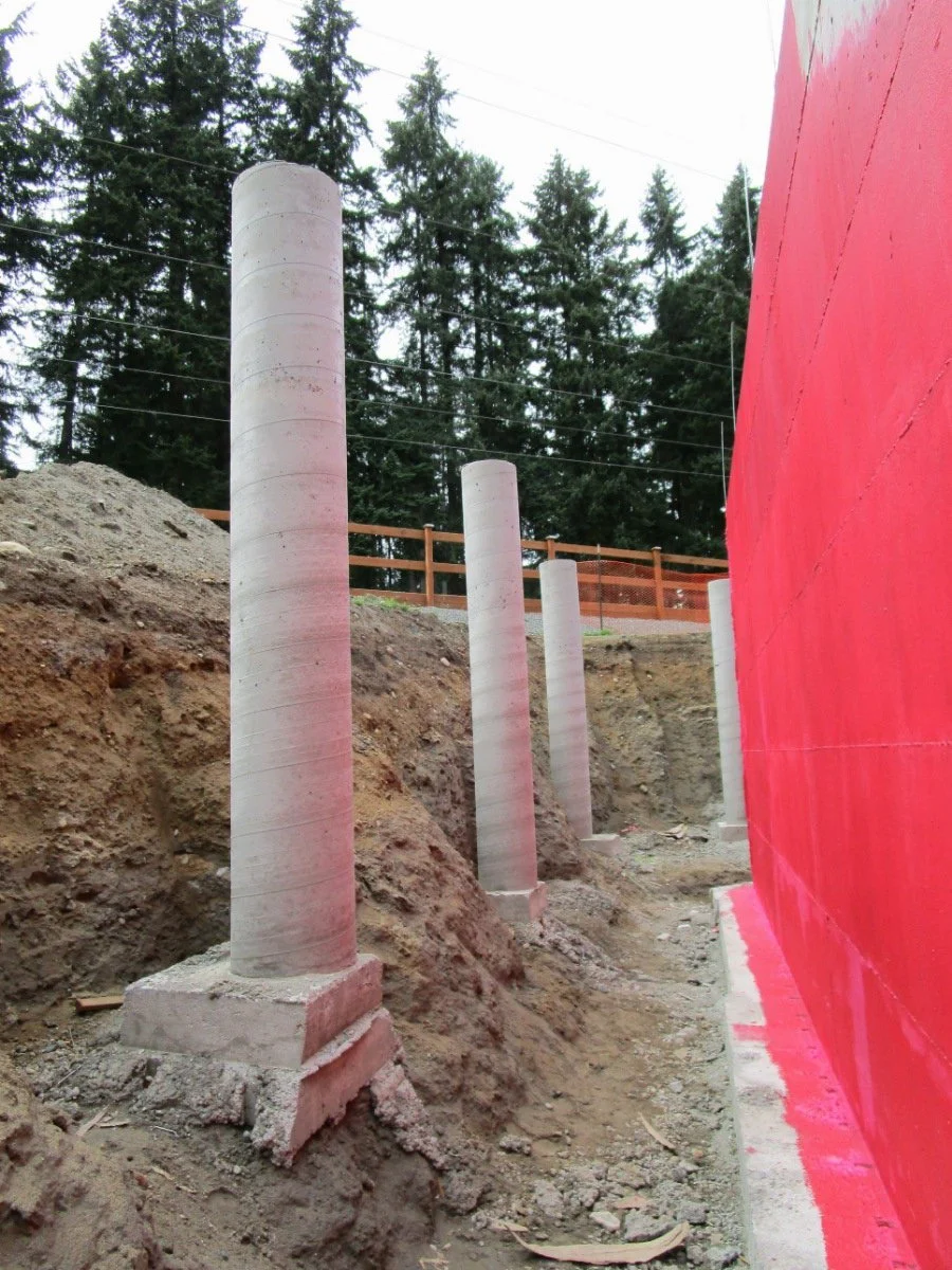 Walls poured, concrete columns will support future point loads.