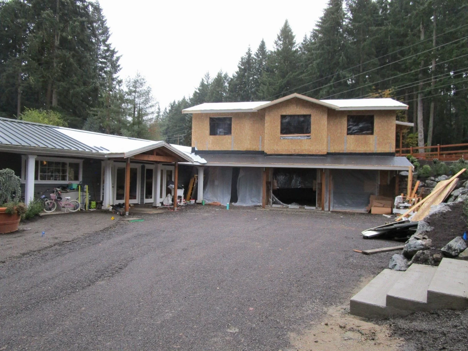 Roof trusses and membrane installed.