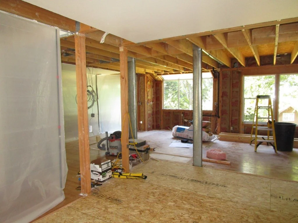 Demolition has started. HVAC people will reroute vertical metal ductwork that was in a wall.