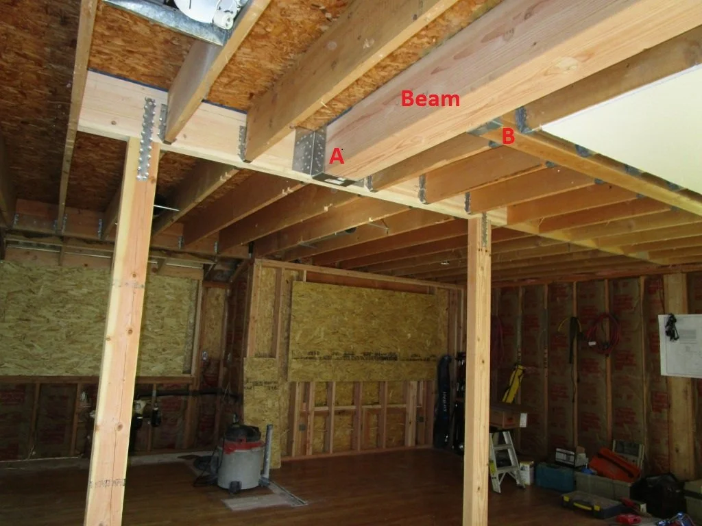 Beams hang from each other to open up the area.