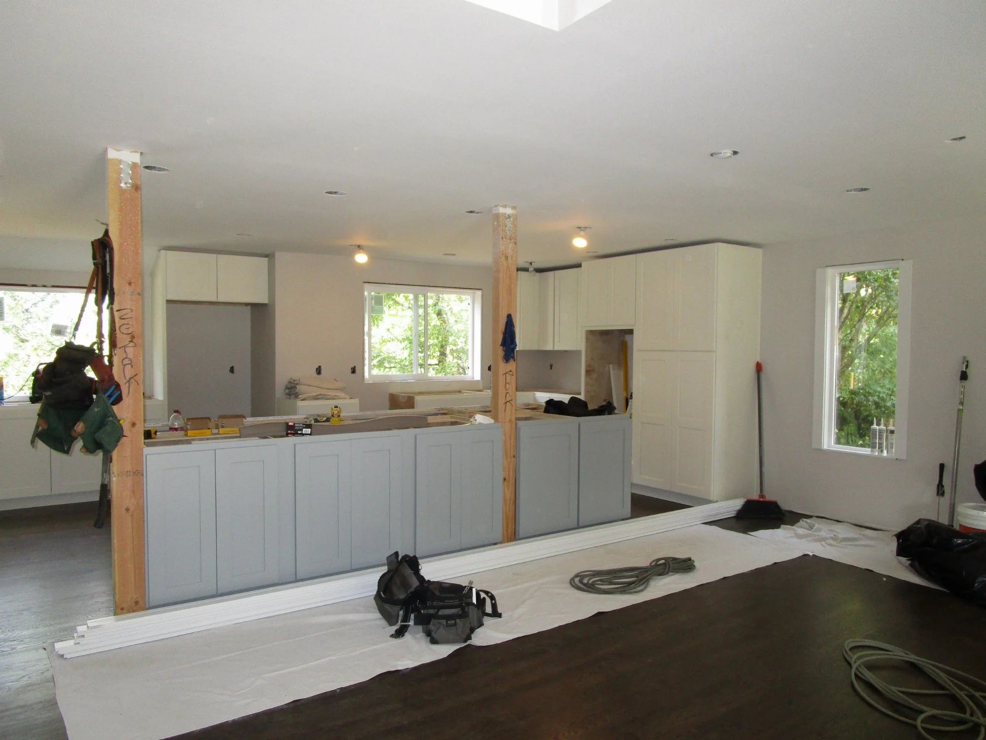 Kitchen cabinets starting to go in.