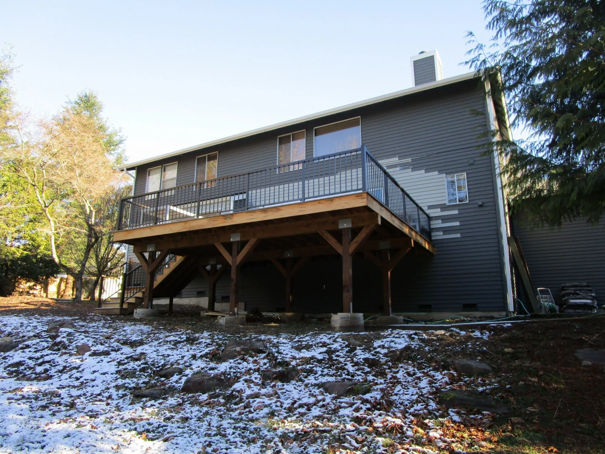 Deck is built, waiting to repaint the house.