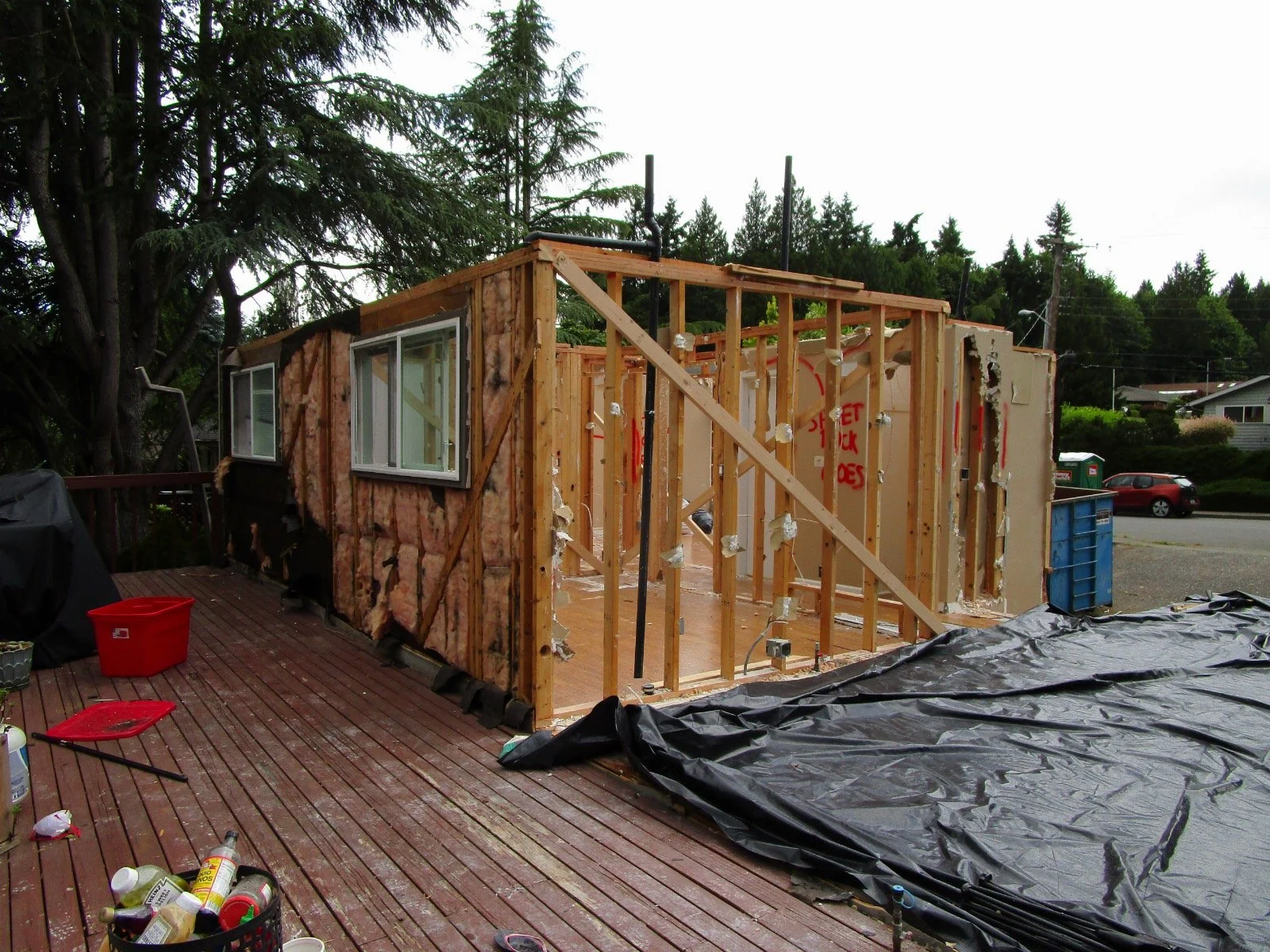 These two room on the main level will be saved. Well at least the 2x4 studs.