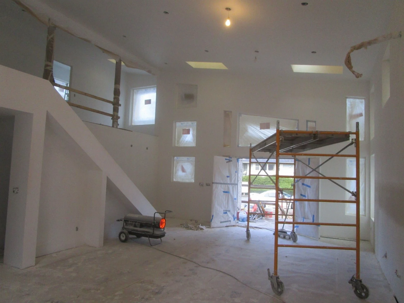 Sheetrock on. View from the Kitchen area.