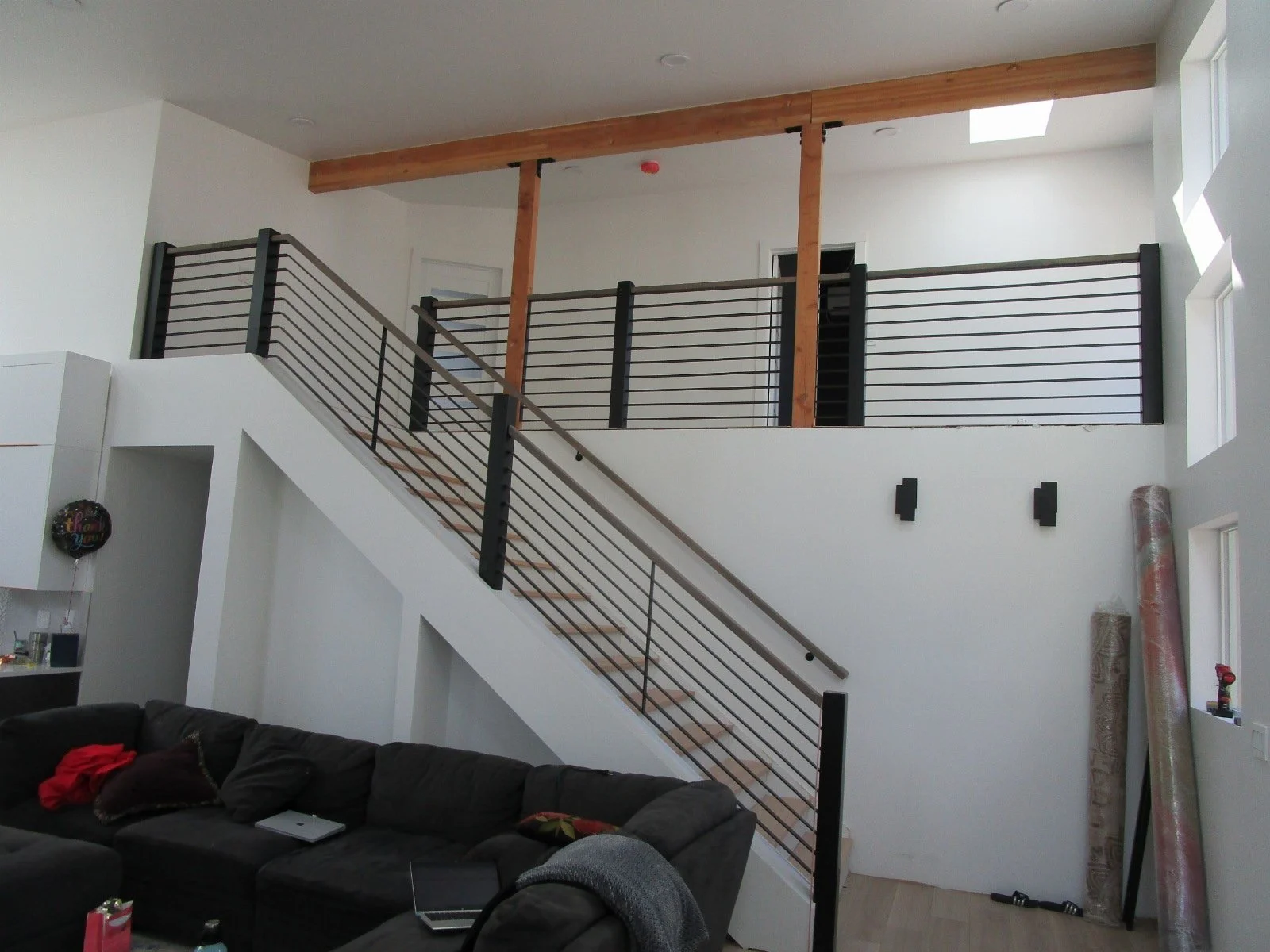 The stair to the new upper level. Cool nooks being built under the stairs.