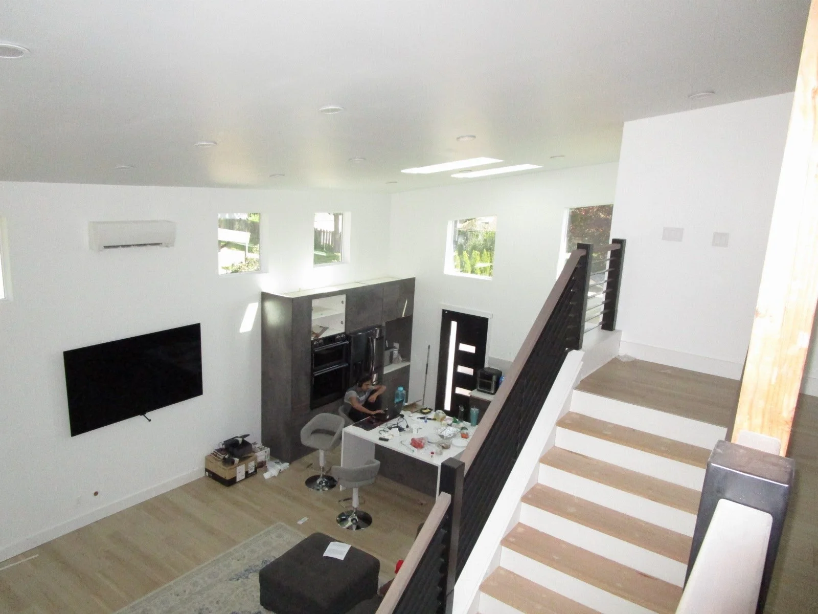 From the upper landing back to the kitchen below.