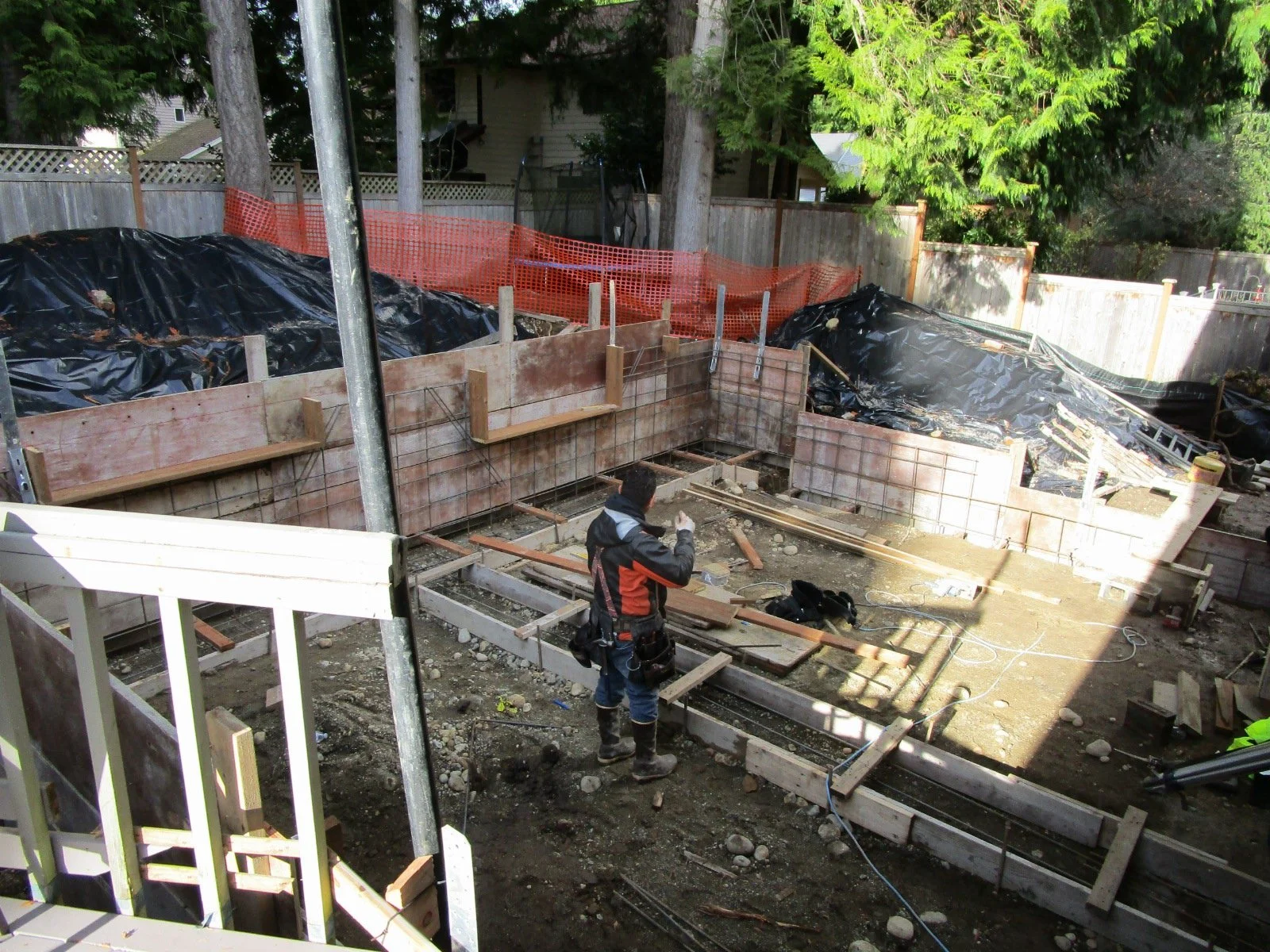 Setting steel rebar for the footings.