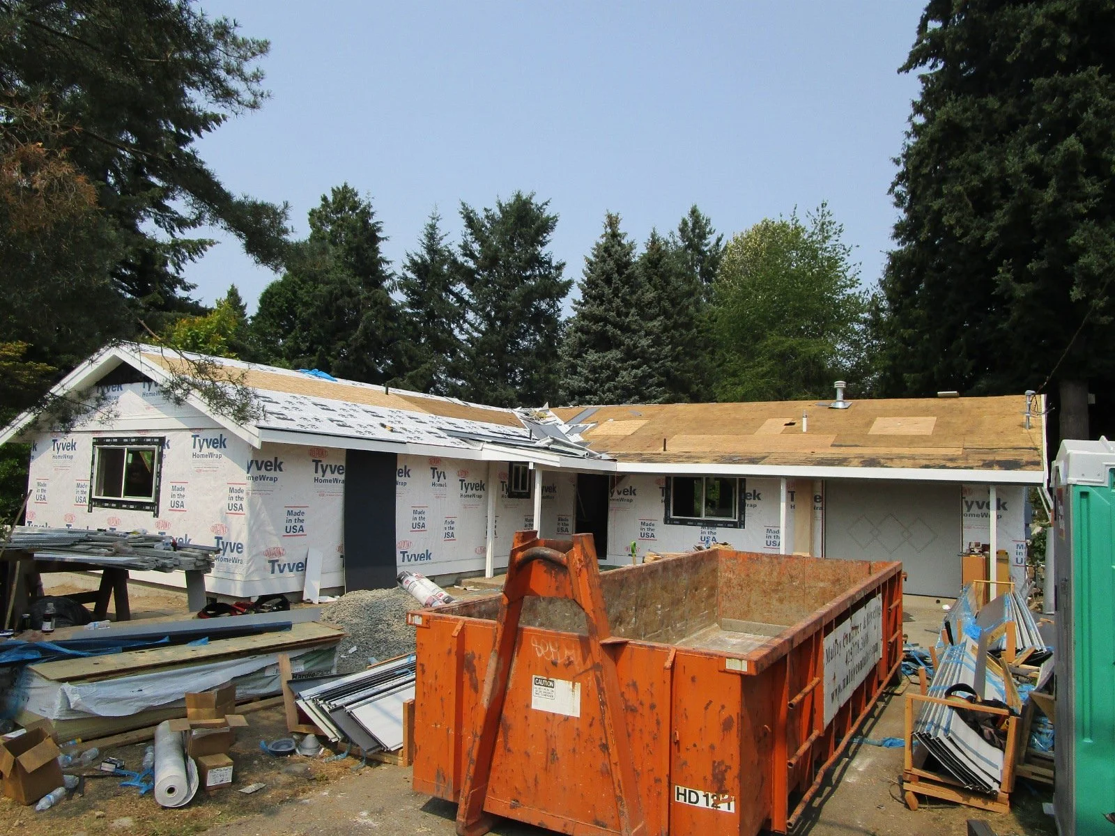 Starting to lay up the metal roofing on the front of the house.