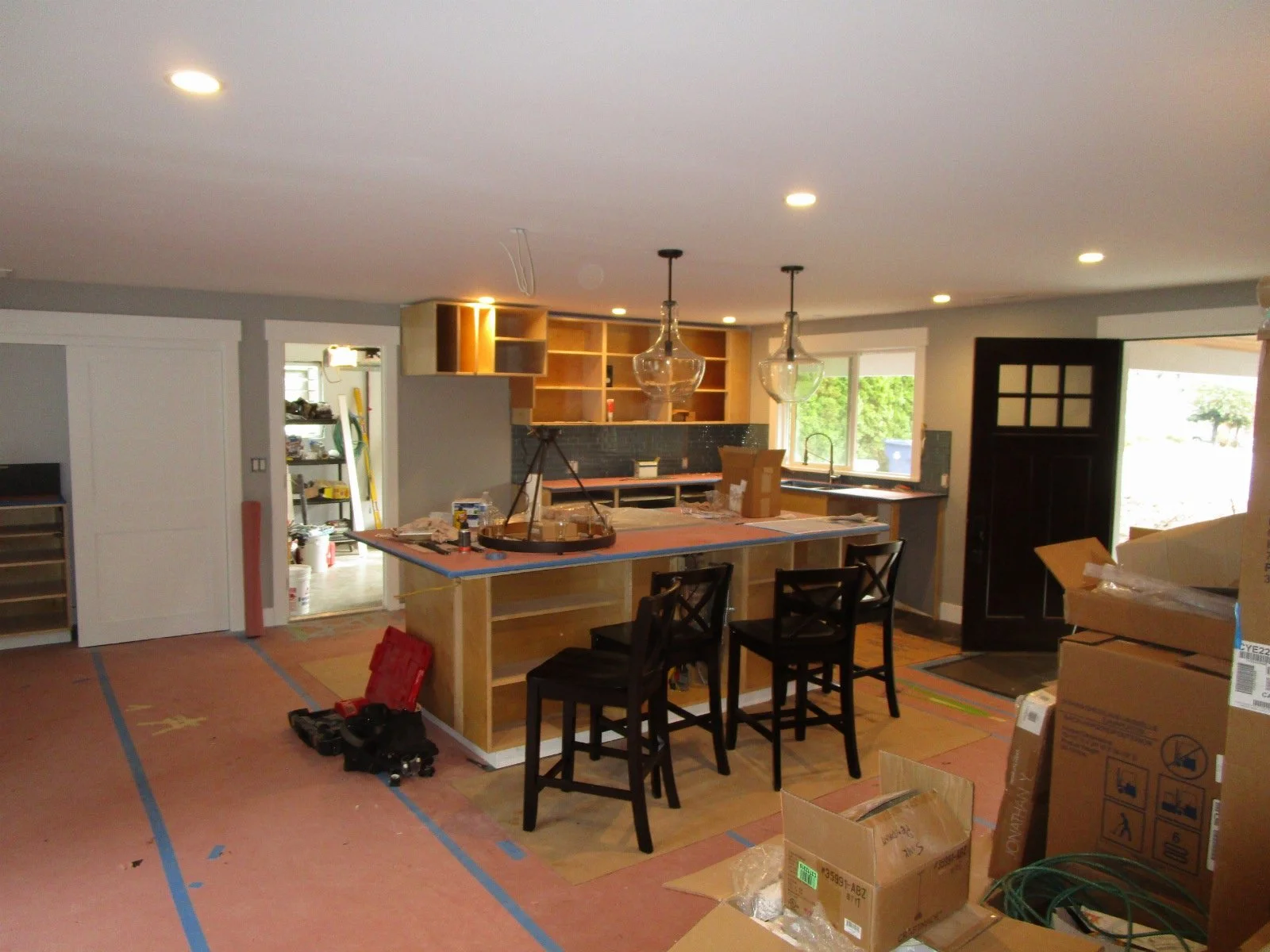 Kitchen cabinets going in.