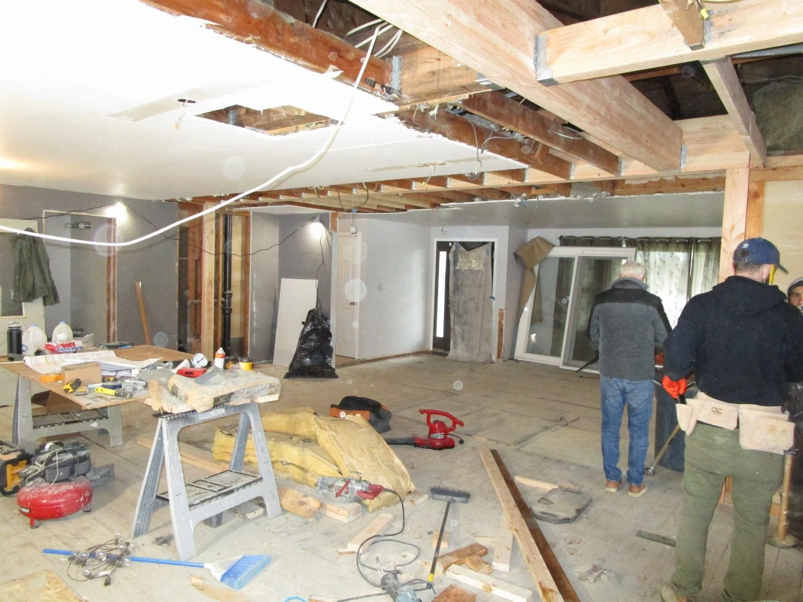 One new big beam hanging from the main glu-lam.