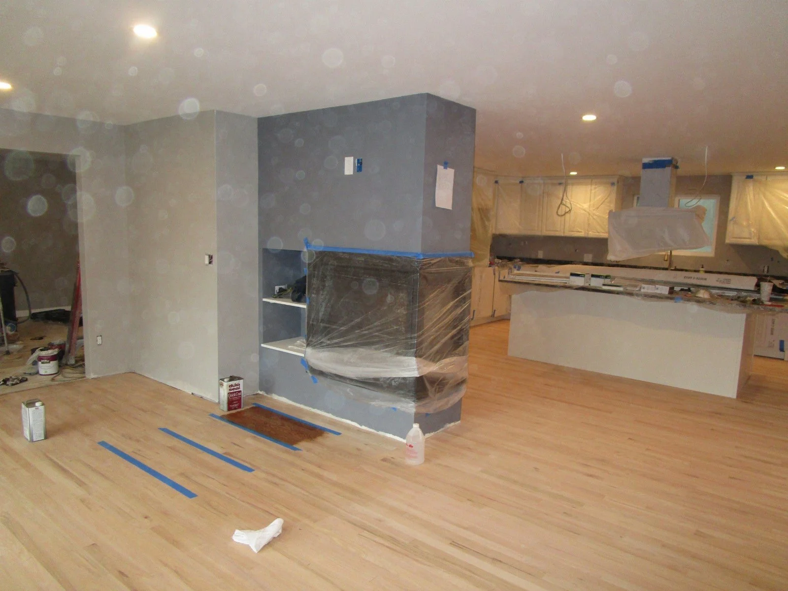 Standing at the entryway, kitchen beyond. Totally open now.