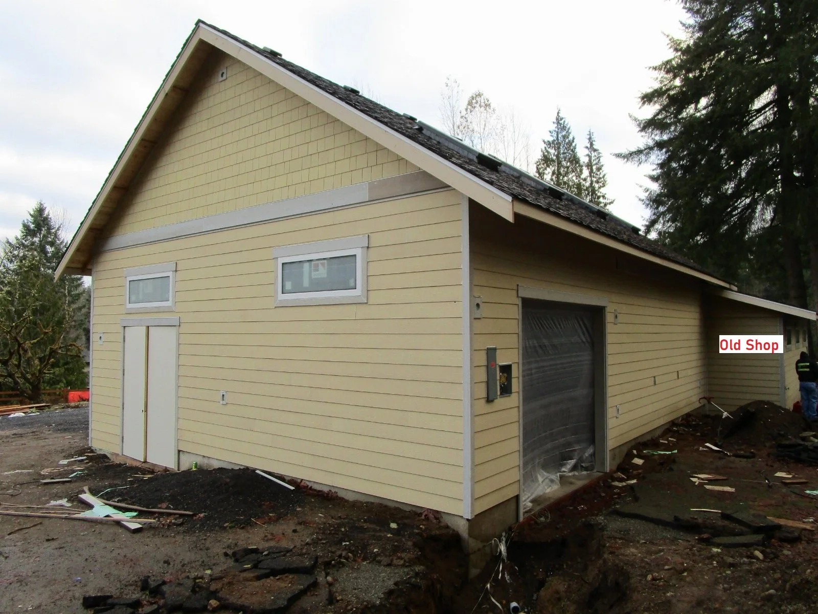 New addition in relation to the old shop on the right.