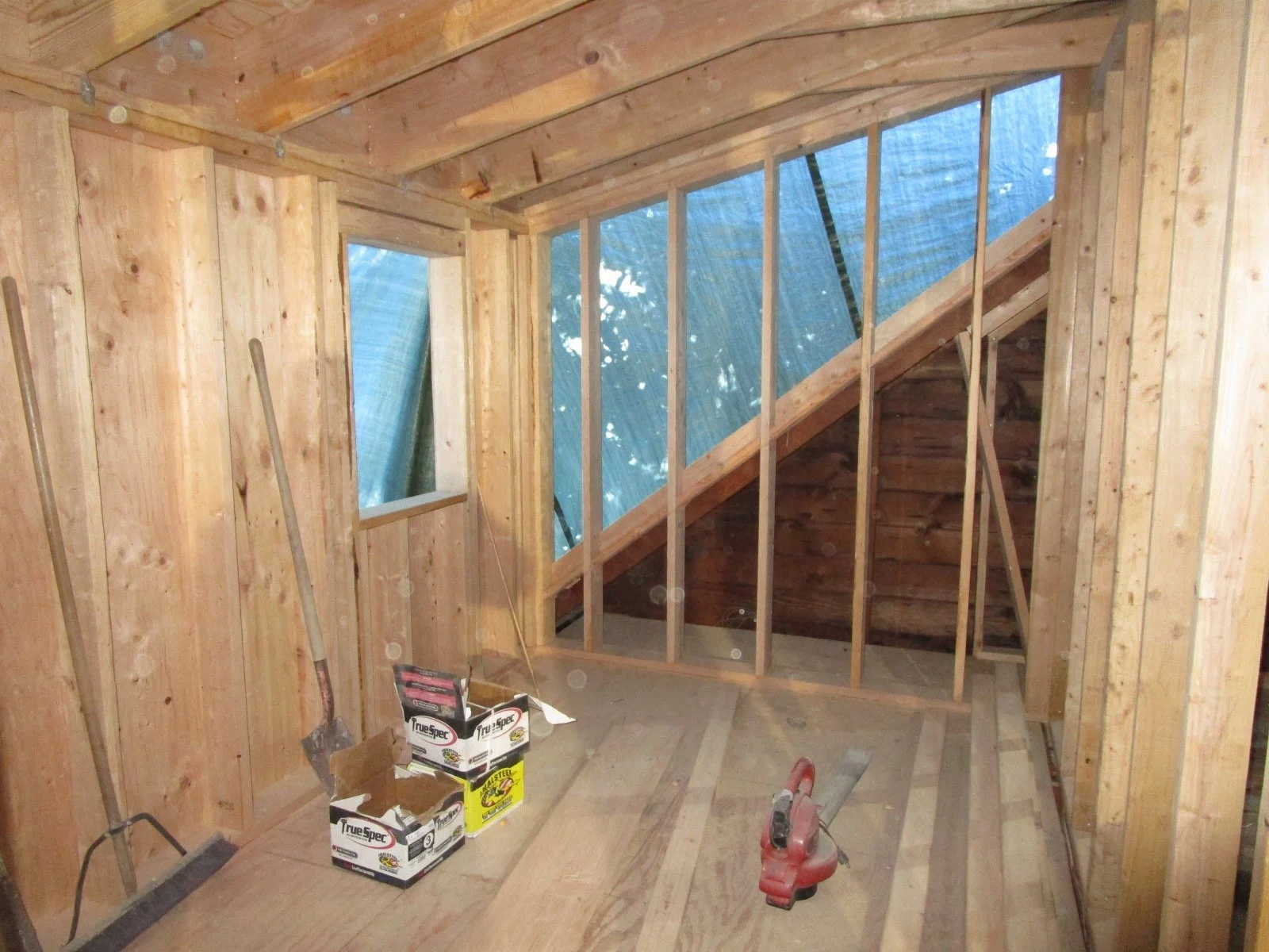 Bathroom area of new dormer getting framed.